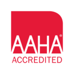 Red and white AAHA logo that reads AAHA accredited